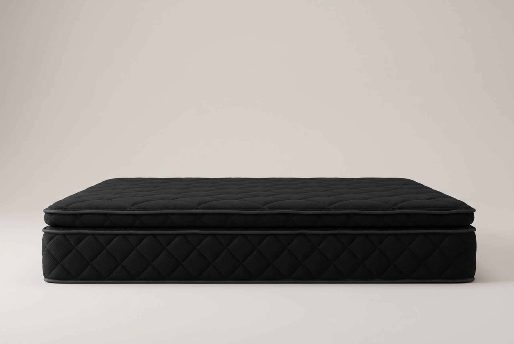 Side profile of the all-black Queen mattress showing its full thickness and quilted eurotop